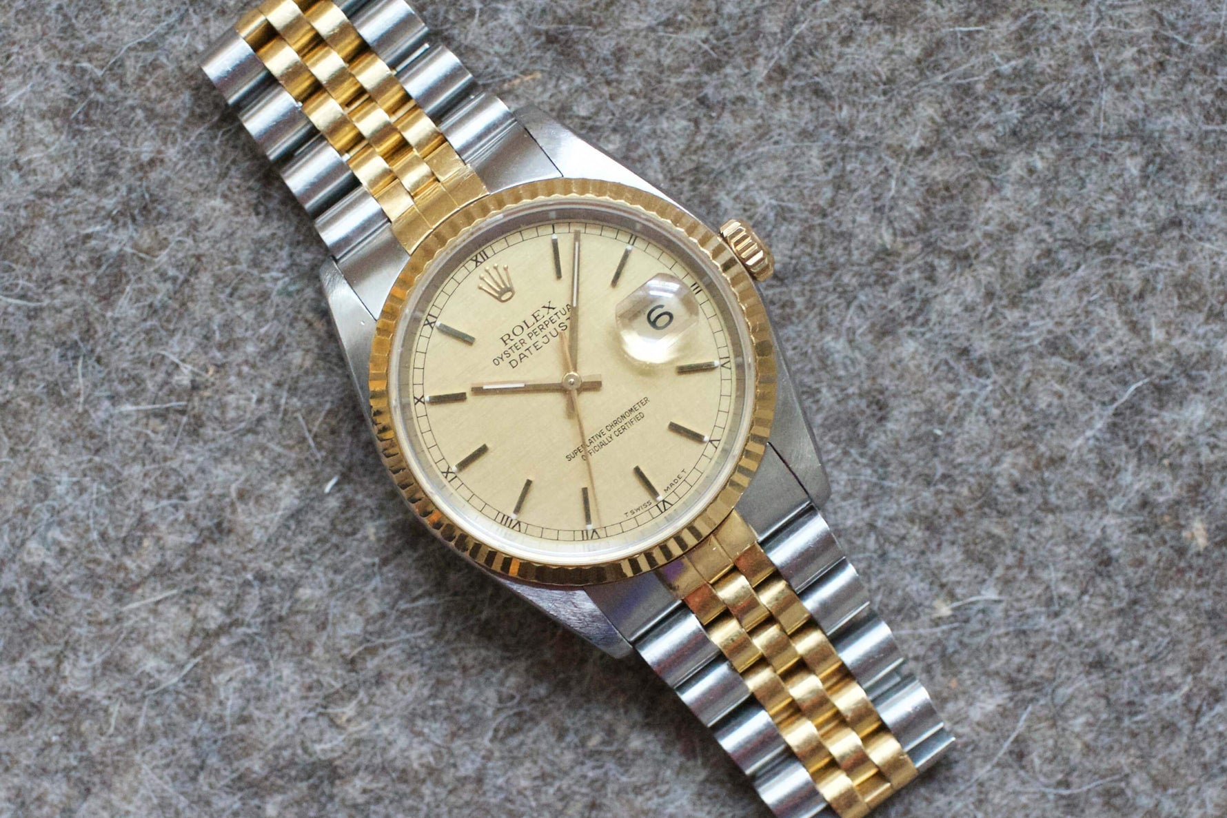 SOLDOUT: Rolex DateJust 36mm LINEN DIAL 18K Two-Tone HOLES Champagne Jubilee Watch 16233 - WearingTime Luxury Watches