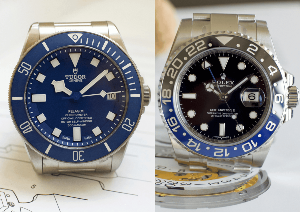 Side-by-side Tudor Pelagos blue dial and Rolex GMT-Master II black and blue bezel luxury watches