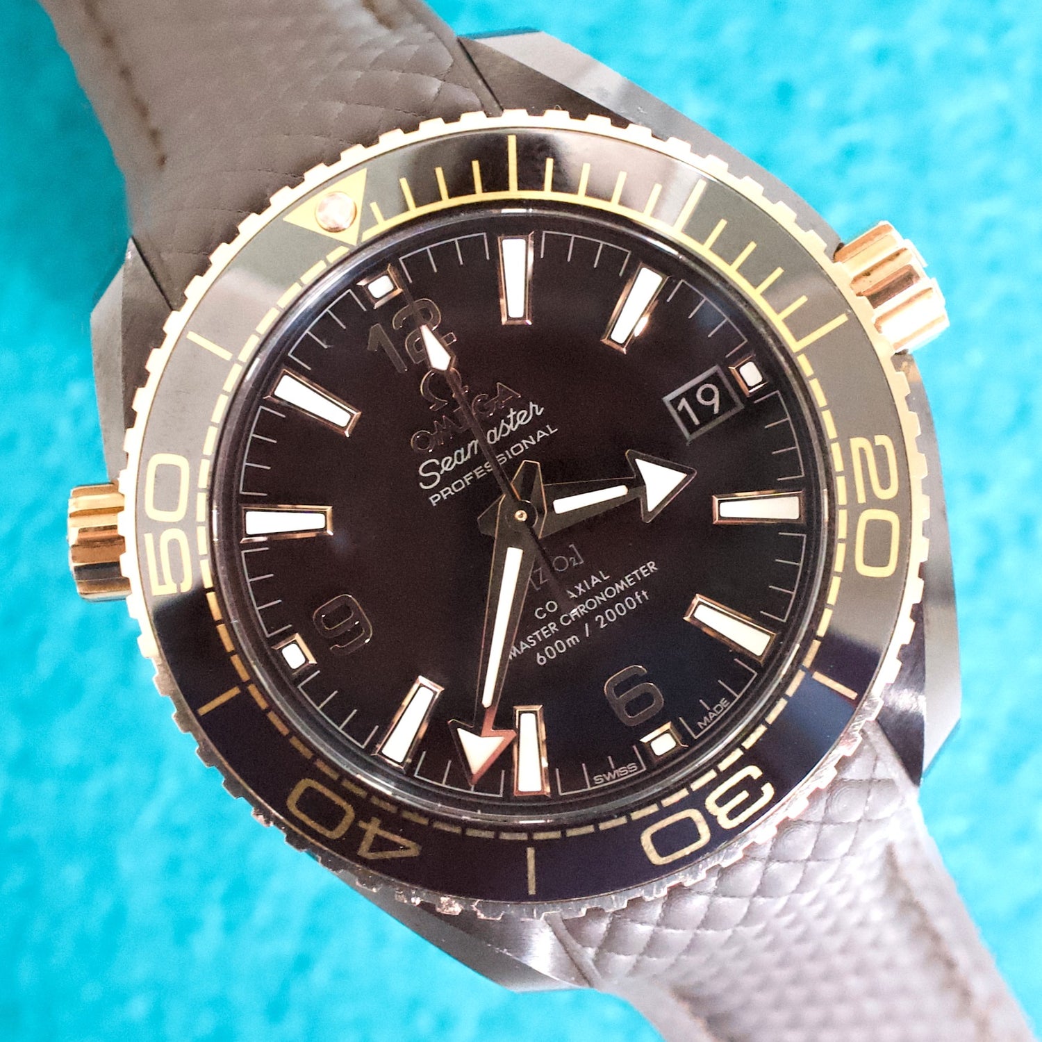Omega Seamaster Planet Ocean 215.62.40.20.13.001 Dark Brown Ceramic Factory Rubber Strap Sedna Gold Bezel Box and Papers