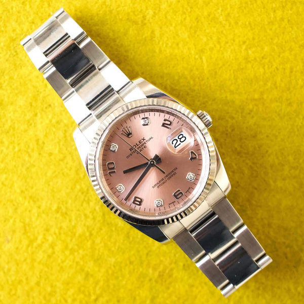 SOLDOUT: Rolex Oyster Perpetual Date 115234 34MM Factory Pink/Salmon Diamond Dial Factory Warranty Travel Box and Service Papers