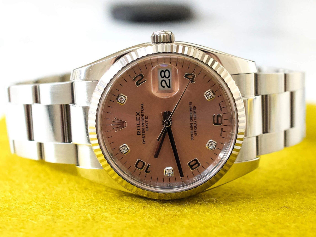 Rolex Oyster Perpetual Date 115234 34MM Factory Pink/Salmon Diamond Dial Factory Warranty Travel Box and Service Papers - WearingTime Luxury Watches