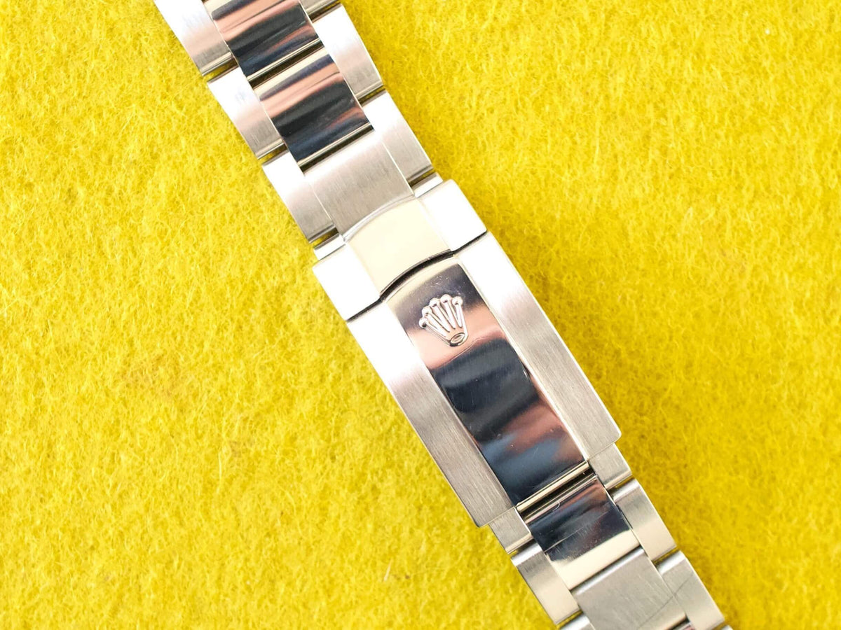 Rolex Oyster Perpetual Date 115234 34MM Factory Pink/Salmon Diamond Dial Factory Warranty Travel Box and Service Papers - WearingTime Luxury Watches