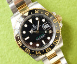 SOLDOUT: Rolex GMT Master II 116713LN CERAMIC Gold and Steel Automatic GMT Black Dial Box PAPERS