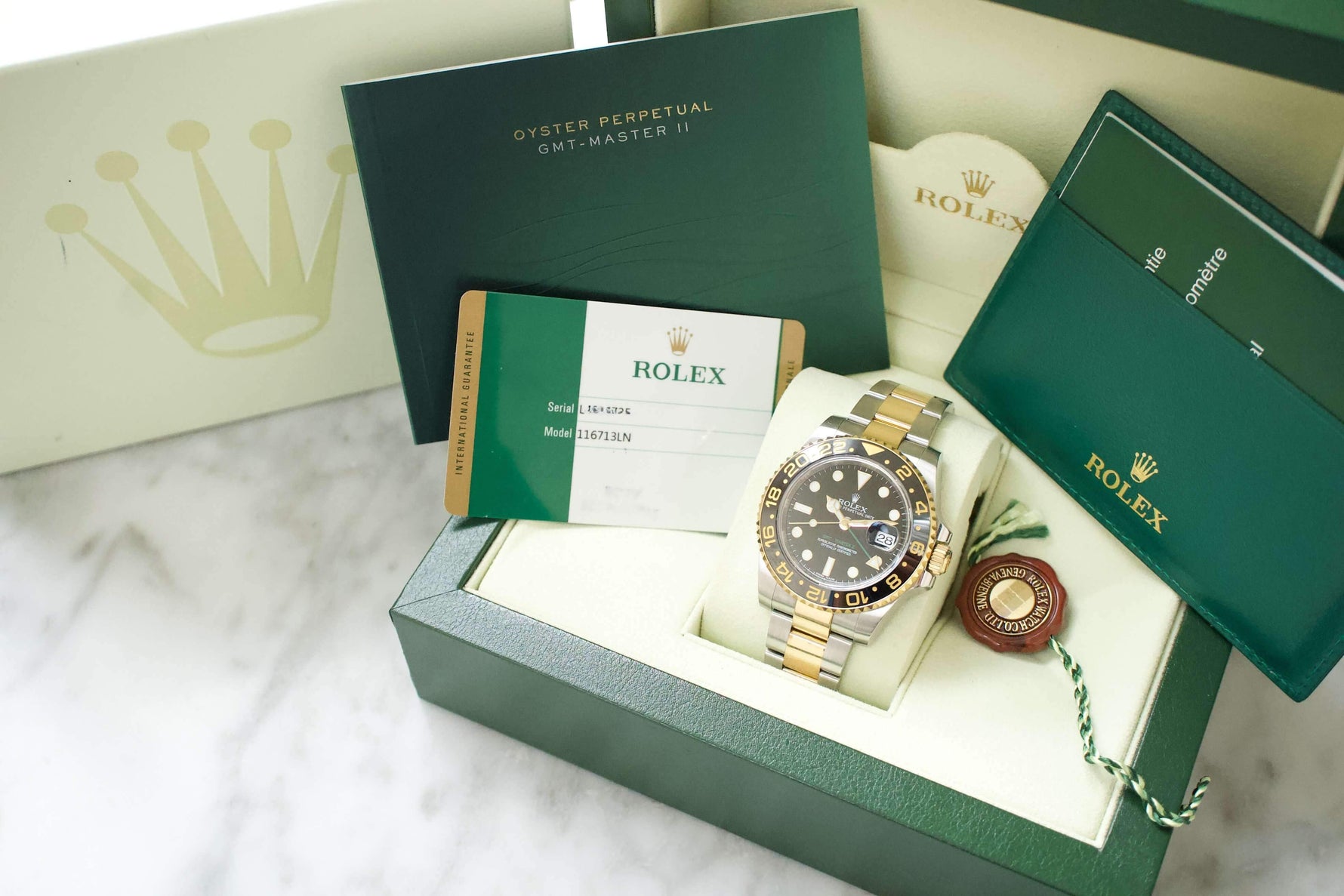 SOLDOUT: Rolex GMT Master II 116713LN CERAMIC Gold and Steel