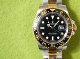 SOLDOUT: Rolex GMT Master II 116713LN CERAMIC Gold and Steel Automatic GMT Black Dial Box PAPERS