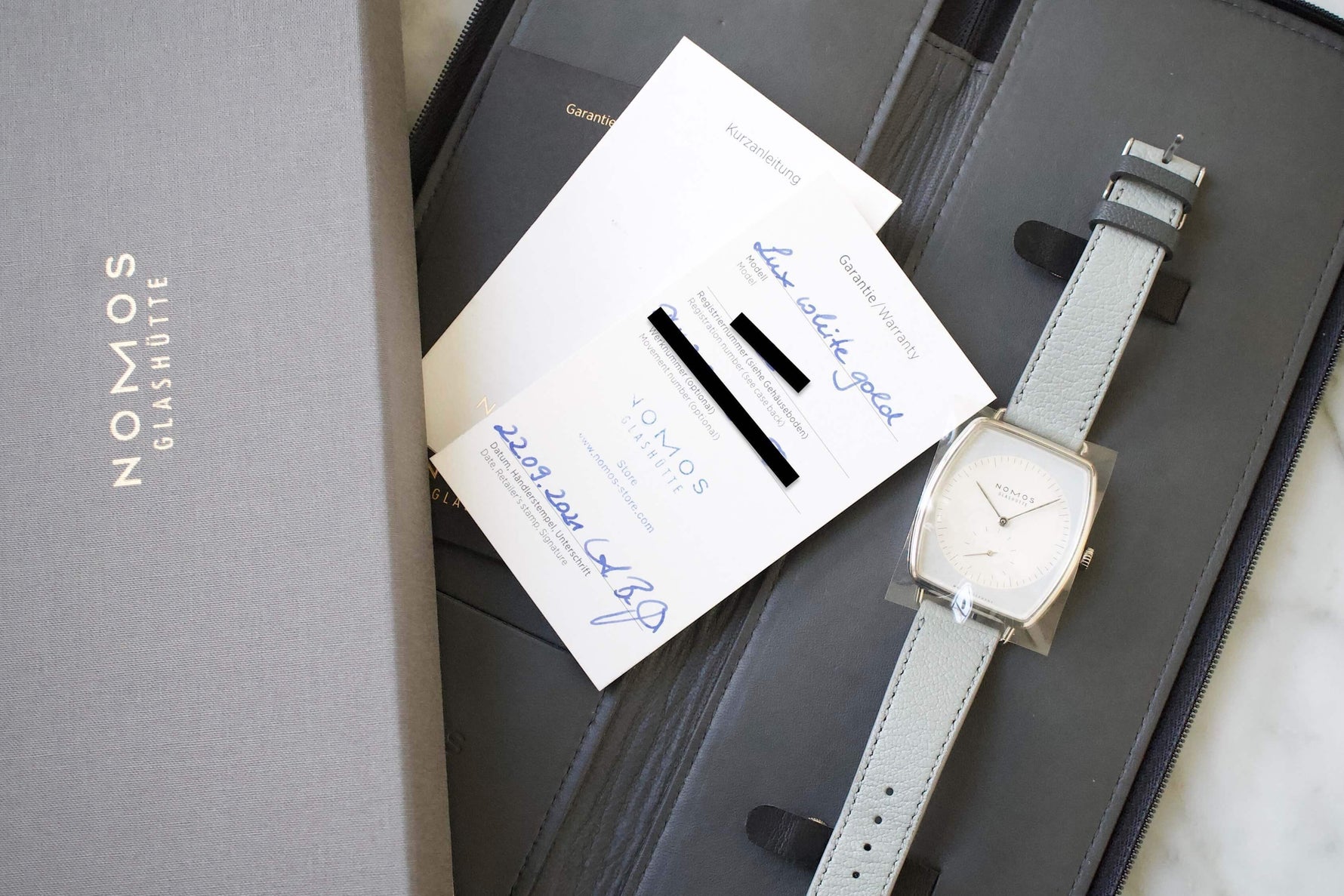 NOMOS LUX 18K Solid White Gold Ref. 920 Tonneau 40mm In House Movement - WearingTime Luxury Watches