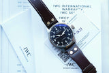 IWC Schaffhausen automatic luxury watch with brown leather strap and official warranty documents