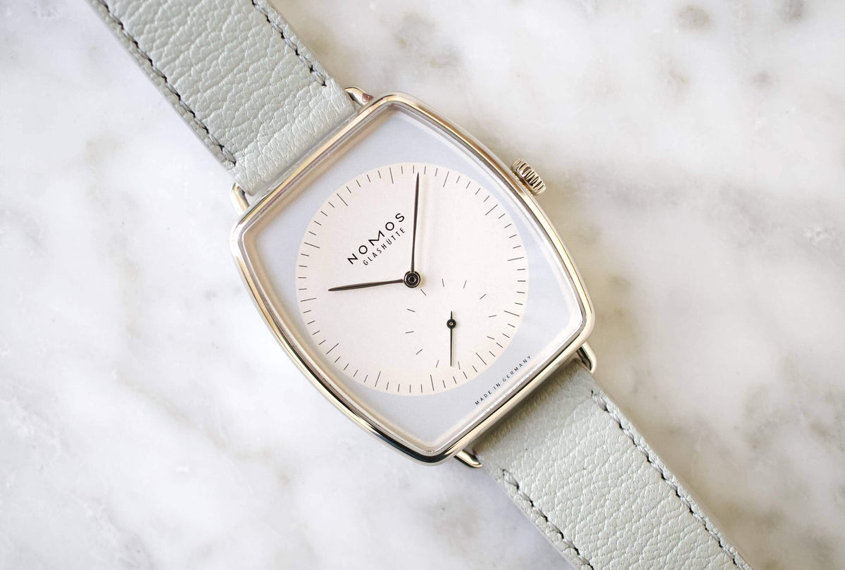 SOLD OUT: NOMOS LUX Ref. 942 TONNEAU 38.5 x 34mm White Gold Box Papers - WearingTime Luxury Watches