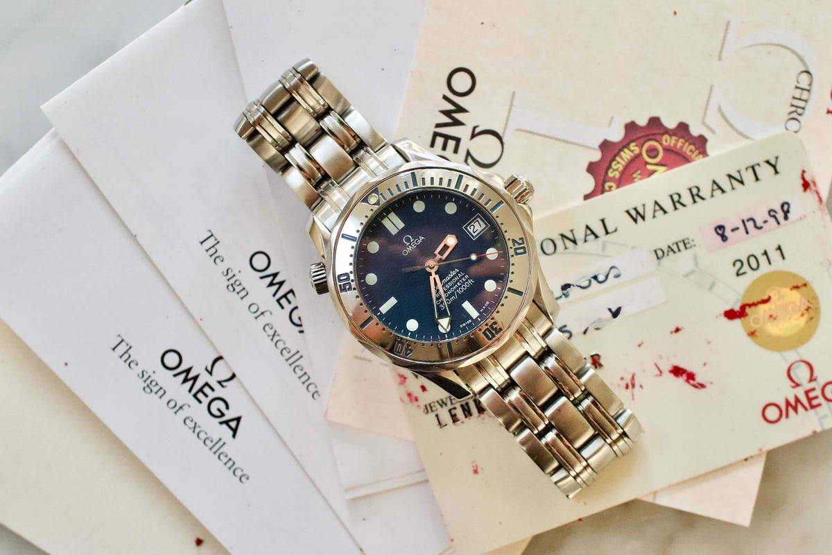 SOLD OUT: Omega Seamaster 300m Blue Wave Dial 36mm Box Papers FACTORY SERVICED 2552.80.00 - WearingTime Luxury Watches