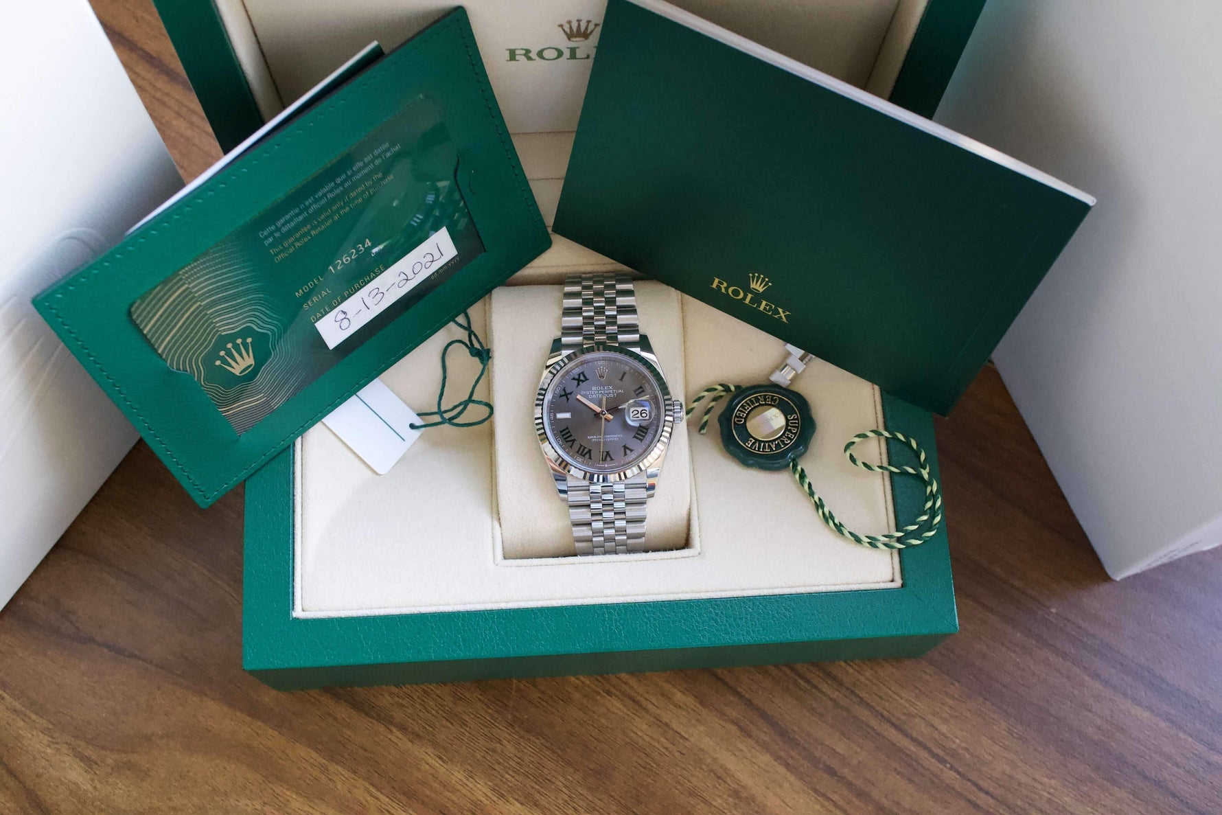 SOLD: ROLEX DATEJUST 36 WIMBLEDON Jubilee 126234 GREEN Rhodium ROMAN Box and Papers 18K Bezel - WearingTime Luxury Watches