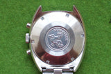 Back view of a stainless steel Omega Seamaster watch case showing the engraved logo.