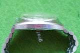 Side view of a luxury watch with a stainless steel case and jubilee bracelet