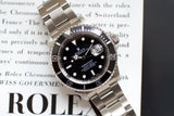 2006 Rolex Submariner 16610 stainless steel luxury dive watch with black dial and date display