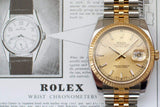 Two-tone Rolex Datejust with champagne dial on bracelet, displayed over vintage watch advertisement.
