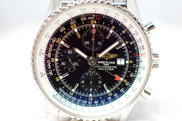 Close-up of Breitling Navitimer World Chronograph with black dial, subdials, and stainless bezel