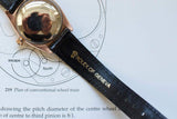 Vintage rose gold bubble back Swiss watch with black leather strap marked 'Rolex of Geneva'