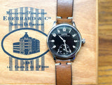 Vintage Eberhard & Co luxury Swiss watch with brown leather strap on original wooden box