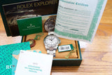 Rolex Explorer watch with factory service booklet, authenticity certificate, and original box.