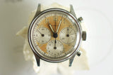 Vintage Swiss chronograph watch with patina dial, subdials, and stainless steel case