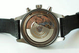 Swiss automatic chronograph watch with open caseback displaying intricate movement