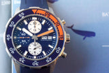 Blue and orange Swiss chronograph dive watch with day-date display and rubber strap