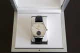Luxury IWC Portuguese hand-wound watch with black leather strap in display box
