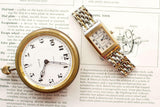 Close-up of a luxury gold watch and a gold watch face on a vintage clockmaking diagram.