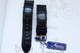 Black leather alligator watch strap with buckle and Minerva 1858 tag on white background