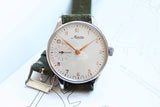 Minerva limited edition men's watch with white dial, gold markers, green suede strap