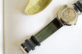 Luxury mechanical watch with exhibition case back and green shell cordovan leather strap