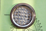 Case back of an Omega Swiss-made stainless steel watch with serial number 145022-69 ST