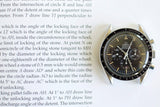 Vintage Omega Speedmaster Professional chronograph watch with black dial on open book