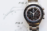 Omega Speedmaster Professional Moonwatch with stainless steel band on technical drawing background