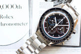 Stainless steel Omega Speedmaster Professional chronograph with black dial and tachymeter bezel
