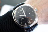 Panerai Radiomir black dial GMT luxury watch with leather strap on wrist