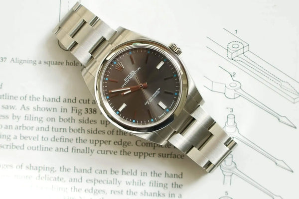 SOLDOUT: Rolex 114300 Oyster Perpetual 39mm Rhodium Dial Box and Papers One Owner