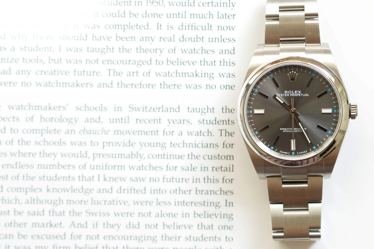 SOLDOUT: Rolex 114300 Oyster Perpetual 39mm Rhodium Dial Box and Papers One Owner - WearingTime Luxury Watches