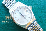 Pre-owned Rolex Oyster Perpetual Date luxury watch with silver dial and jubilee bracelet
