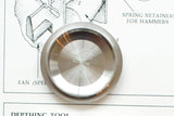 Close-up of a stainless steel Rolex watch case back with Geneva Switzerland engravings.