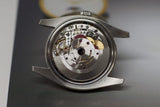 Close-up of Swiss luxury watch automatic movement and intricate gears