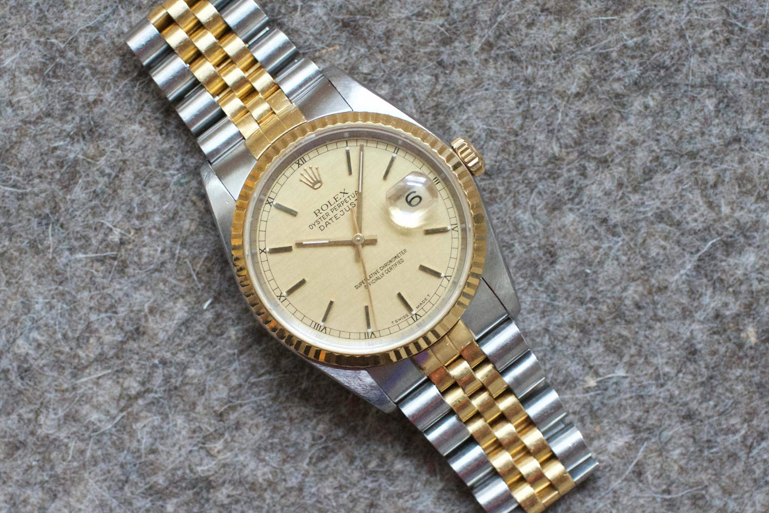 SOLDOUT: Rolex DateJust 36mm LINEN DIAL 18K Two-Tone HOLES Champagne Jubilee Watch 16233 - WearingTime Luxury Watches