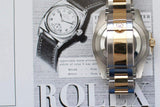 Two-tone stainless steel and gold luxury watch with clasp detail on vintage magazine page