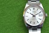 Pre-owned Rolex Oysterdate Precision luxury watch with silver dial and stainless steel bracelet
