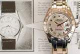 Diamond bezel women's luxury watch with Roman numerals and metal bracelet, close-up view.