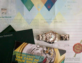 Pre-owned women's luxury watch with papers, documents, and warranty displayed together