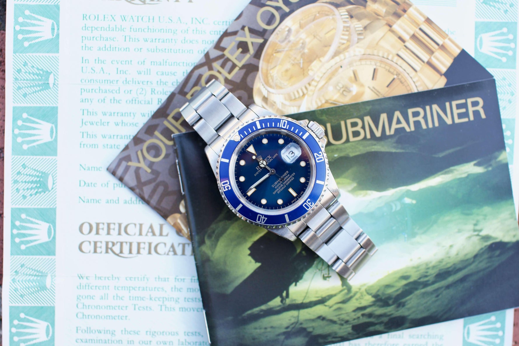 SOLDOUT: Rolex Submariner 16610 "Steel Bluesy" Blue Dial Blue Bezel PAPERS - WearingTime Luxury Watches