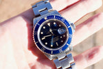 SOLDOUT: Rolex Submariner 16610 "Steel Bluesy" Blue Dial Blue Bezel PAPERS - WearingTime Luxury Watches