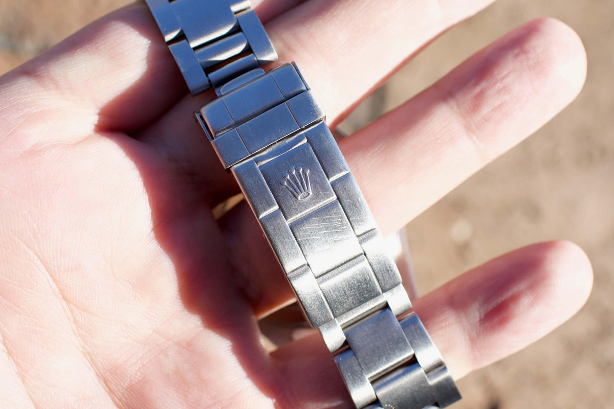 SOLDOUT: Rolex Submariner 16610 "Steel Bluesy" Blue Dial Blue Bezel PAPERS - WearingTime Luxury Watches