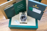 Stainless steel luxury dive watch with black bezel and dial in original box with documents