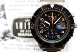Sinn 156 pilot chronograph watch with black dial, tritium markers, and steel bracelet